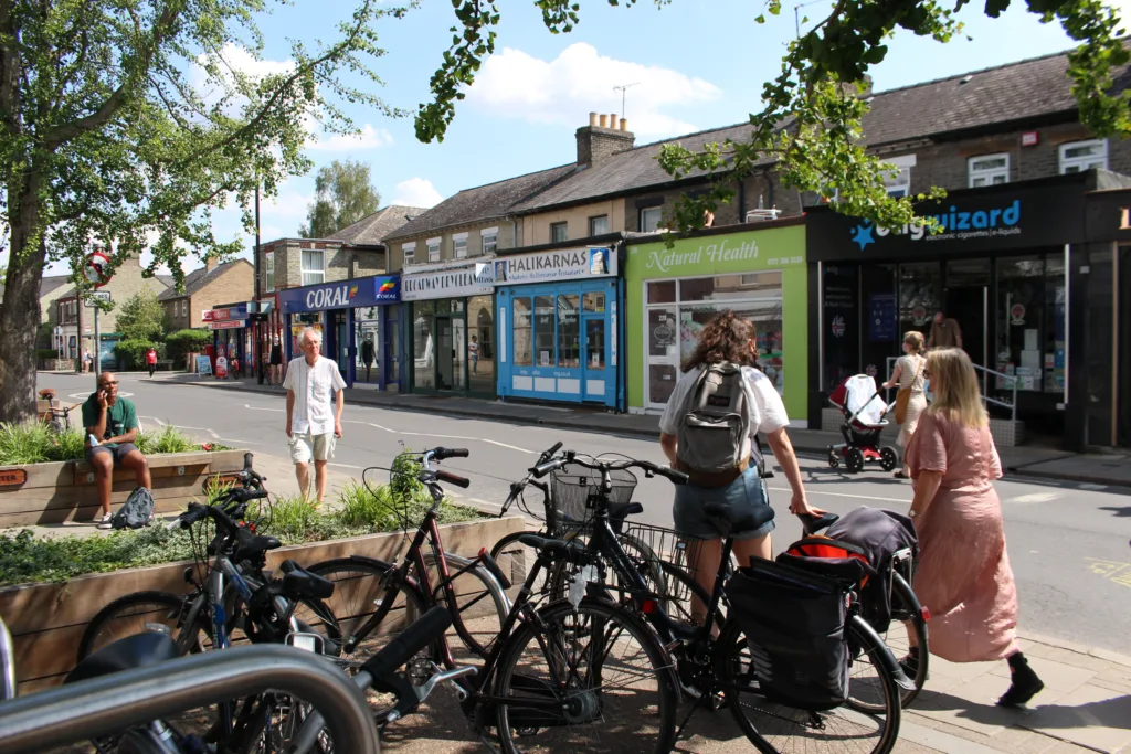 An image of Mill Road taken in July 2021, when an experimental TRO and bus gate on the bridge was in place, are also attached.