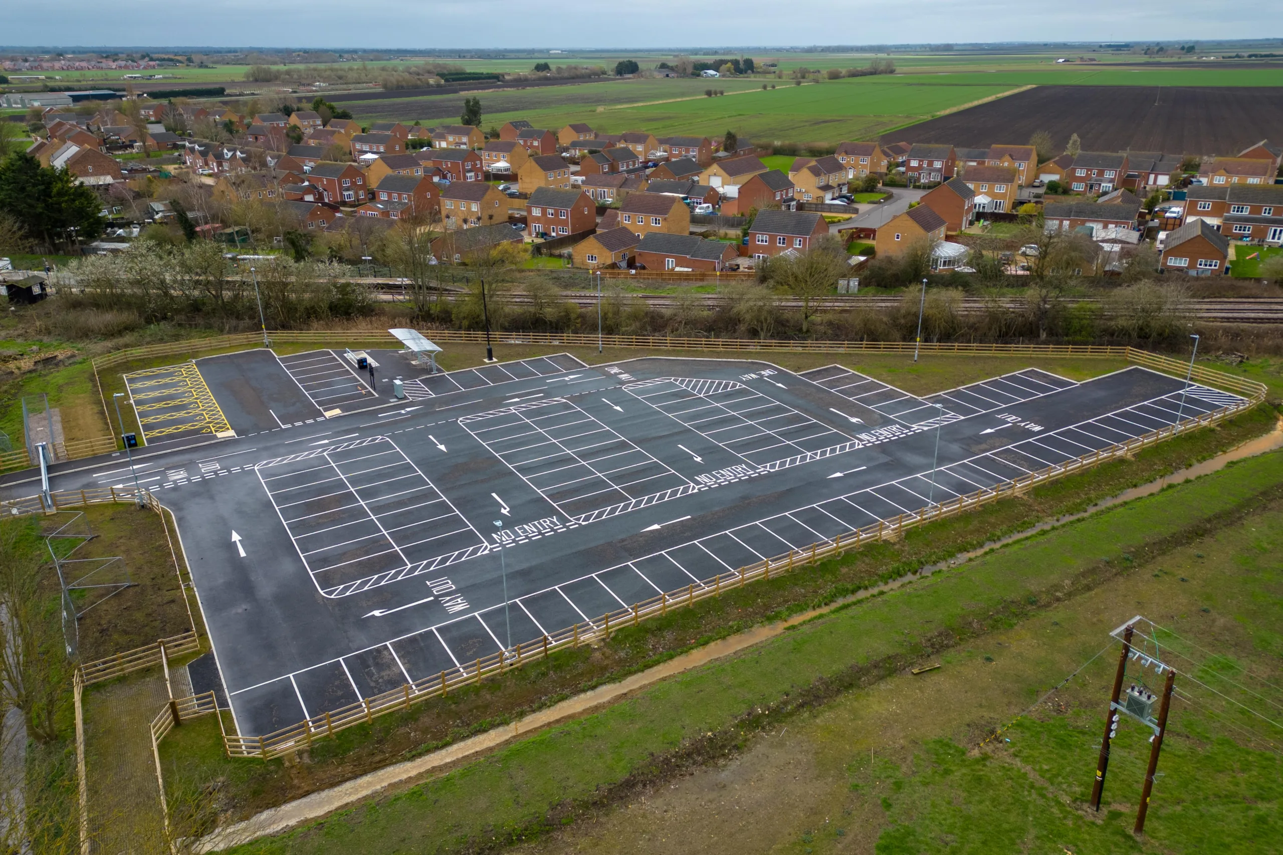 112 space car park not yet arriving at Manea station is a year late