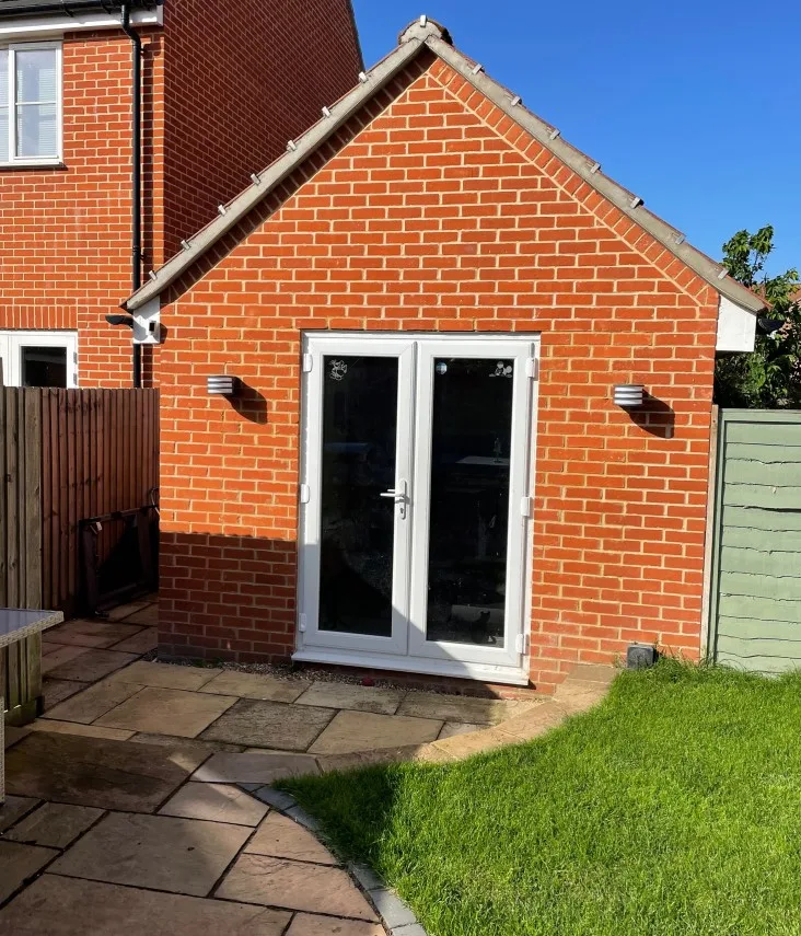 Mark Dobinson produced photos to show East Cambs planners his internal conversion was not visible to the outside world. He also pointed out the garage was not wide enough for either of his two cars.