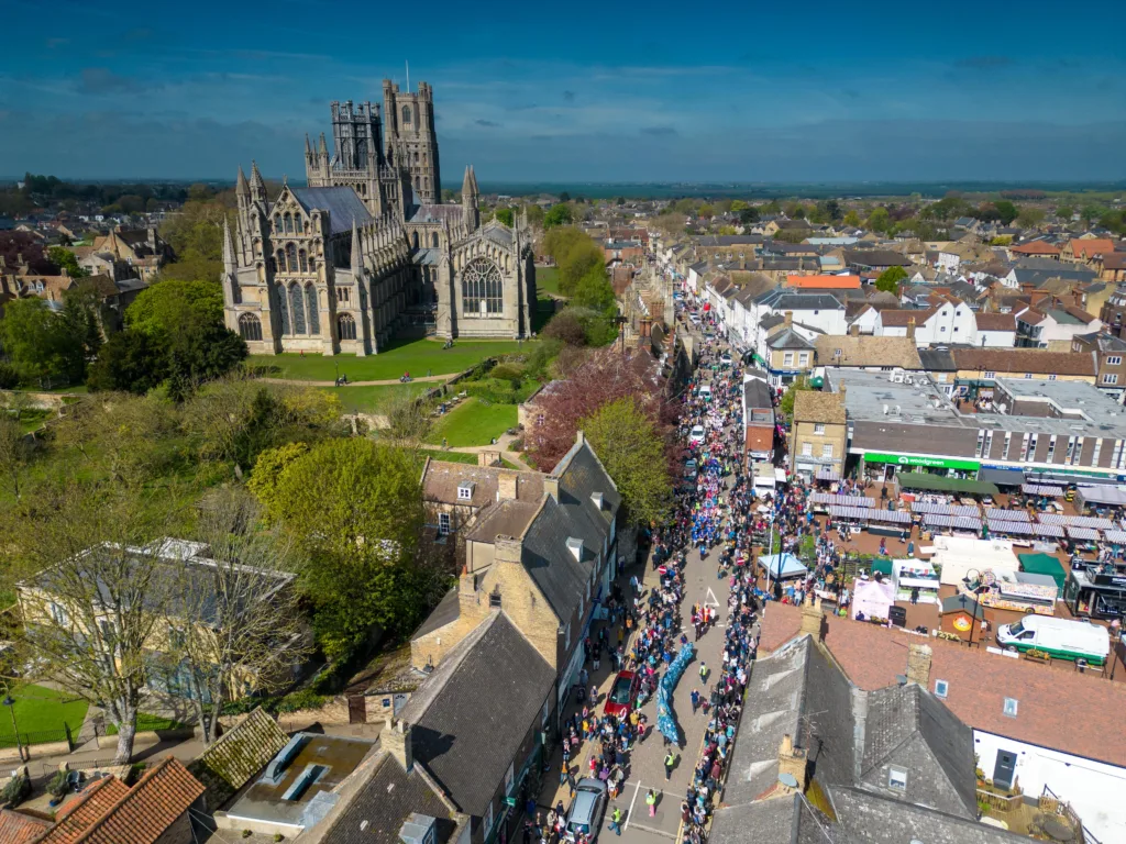 Dubbed ‘Coronation Eel Day’ the spectacular eel focal point snaked its way from Cross Green through the streets to Jubilee Gardens to begin a packed day of events by the river. Picture: TERRY HARRIS 