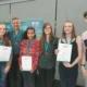 Image caption: Young people receiving their Youth STEMM Award medal from YSA ambassador Mark Thompson (BBC Stargazing Live broadcaster and author). Image credit: John Innes Centre.