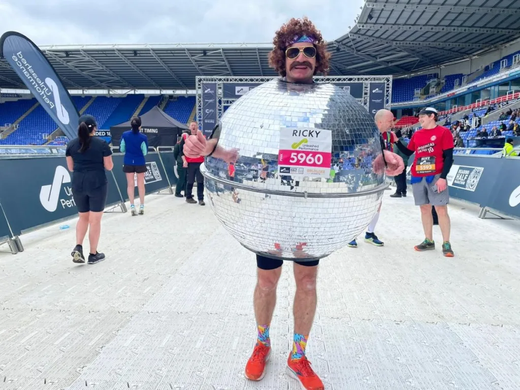 Cambridgeshire cop runs London Marathon dressed in giant disco ball