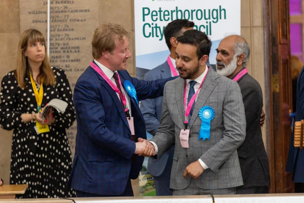 Conservative supporters, MP’s and councillors celebrate Park Ward Victory gaining 2 seats. Local election count and results, Town Hall, Peterborough Friday 05 May 2023. Picture by Terry Harris.