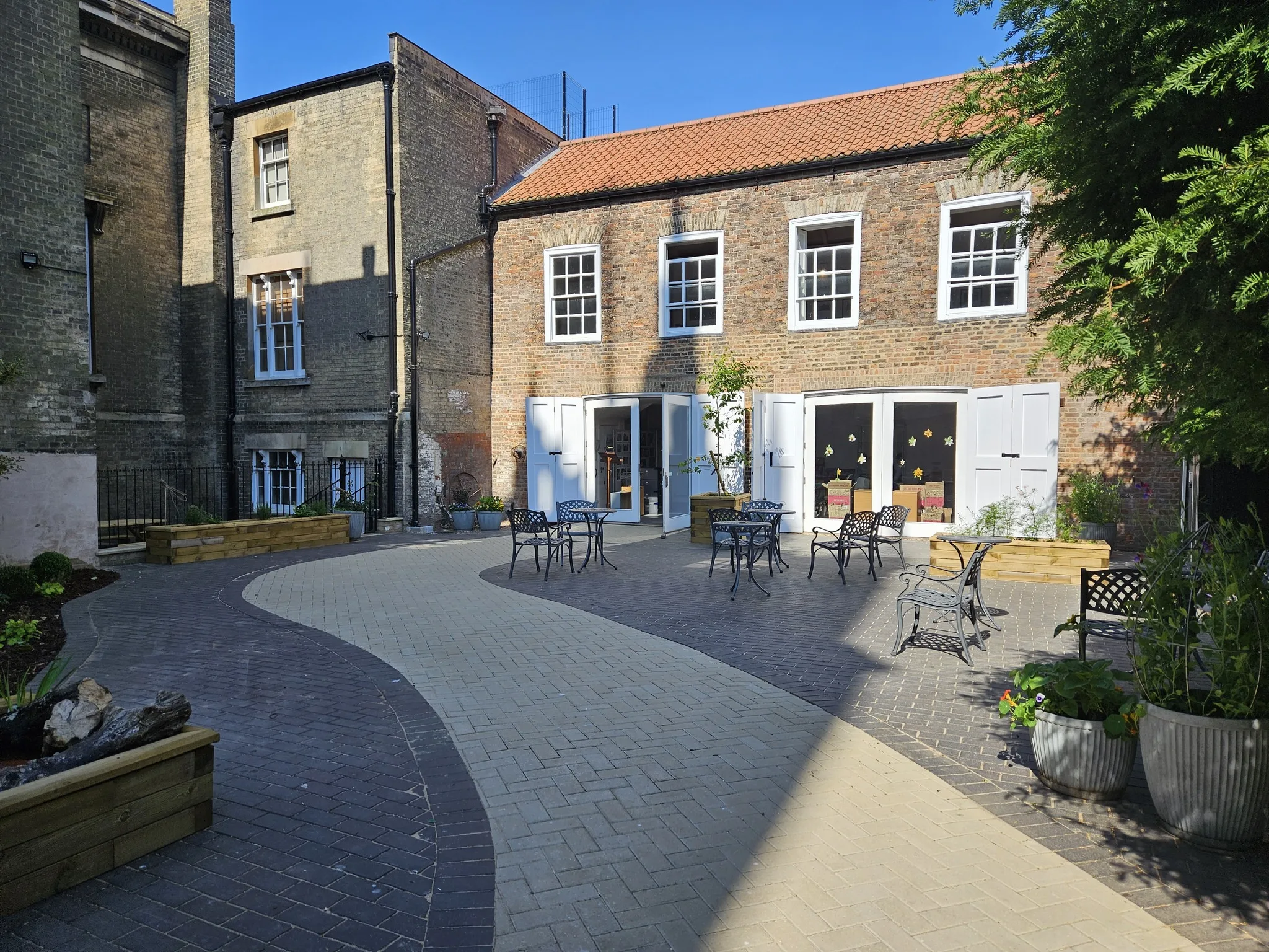 All visitors now enter through the new garden opposite St Peter's Church tower on museum open hours, 10 - 4, Wednesday to Saturday.