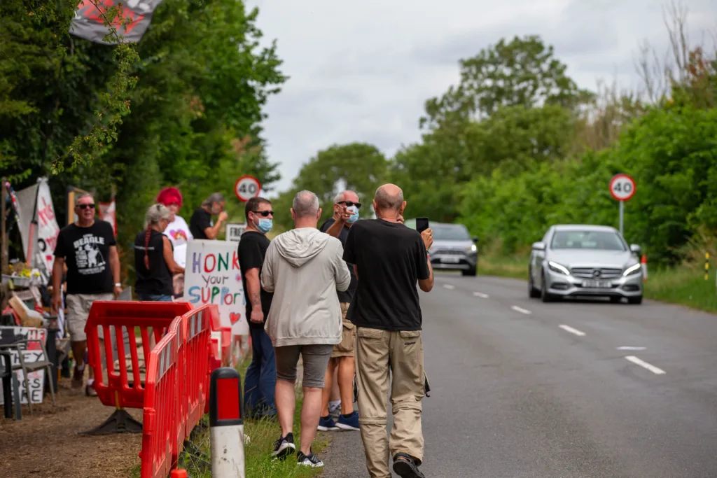 Babestation Zoe Grey and Stella Paris turn up to raise awareness of animal testing at MBR Acres, Bailiffs on behalf of Mills and Reeves throw papers at people in an attempt to serve them but just litter the highway. MBR Acres, Huntingdon Monday 10 July 2023. PHOTO: Terry Harris 