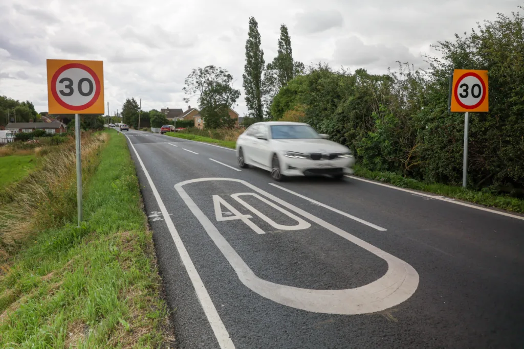 Which to choose: 30mph road signs or 40mph road marking? Drive into Murrow and you decide PHOTO: Terry Harris 