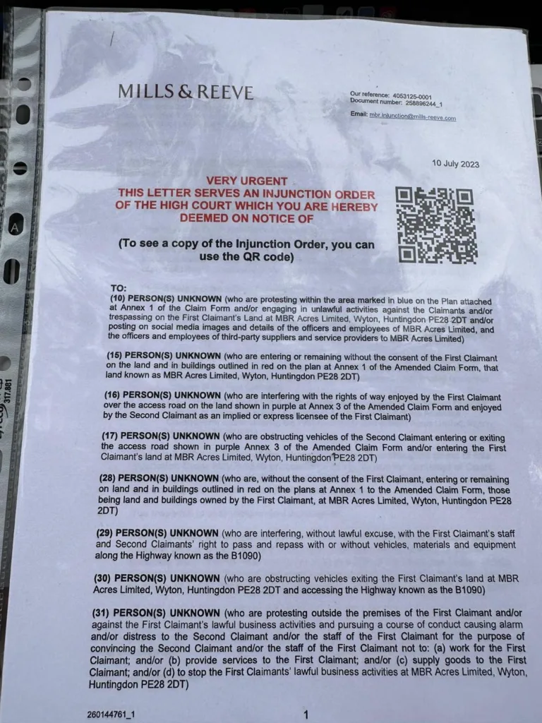 Babestation Zoe Grey and Stella Paris turn up to raise awareness of animal testing at MBR Acres, Bailiffs on behalf of Mills and Reeves throw papers at people in an attempt to serve them but just litter the highway. MBR Acres, Huntingdon Monday 10 July 2023. PHOTO: Terry Harris 