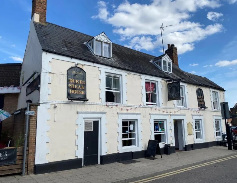 Duke’s Head, Wisbech. Planning application is for change of use of land to form a pub garden and erect a gate (0.91m high max), a timber canopy and timber planters (part retrospective).