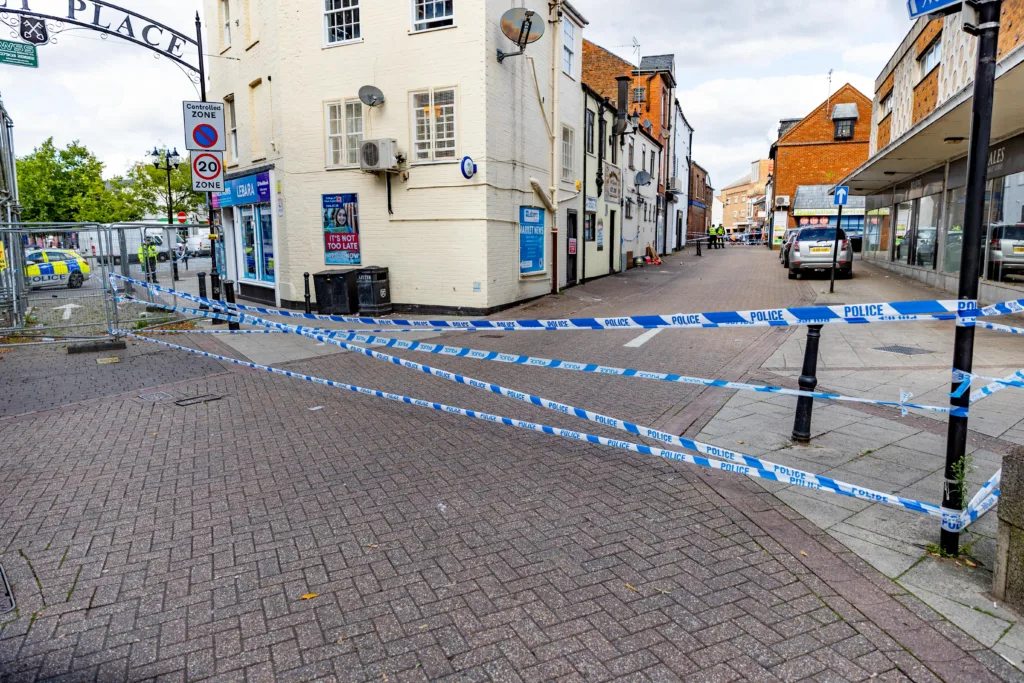 Grim scenes in Wisbech today as a cordon remained in place following a stabbing in or near The Globe public house last night. PHOTO: Terry Harris 