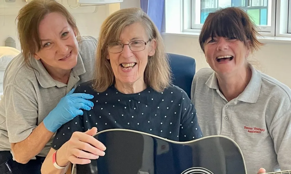 Agnieska Koczur and Sheena Bedborough from Peterborough City Hospital’s Occupational Therapy and Physiotherapy team with stroke survivor Christine Mason