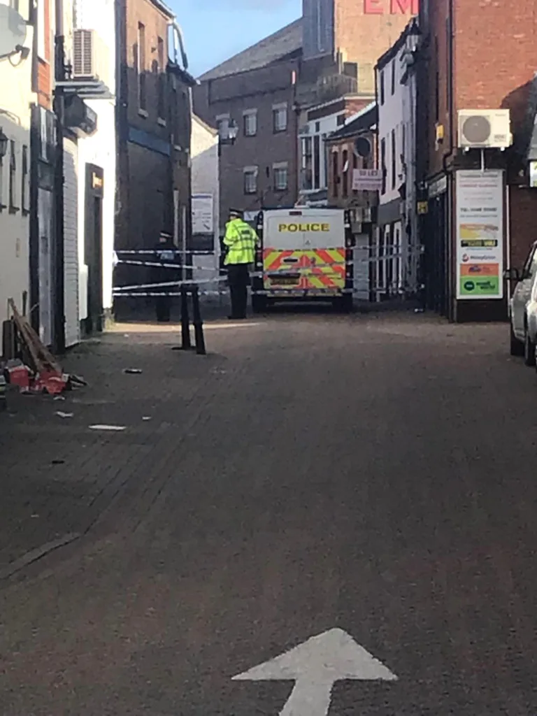 This is the scene confronting visitors and shoppers to Wisbech today. The photos show a police presence in the town and a pub and other businesses cordoned off. 