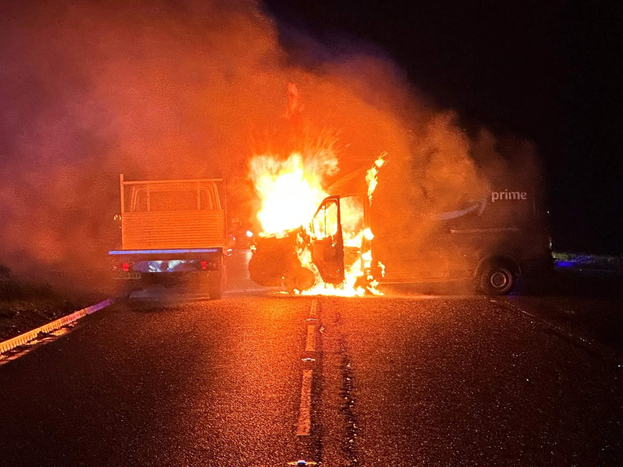 Lucky to be alive: Police photos from the horrendous A47 crash tonight involving a bus and a van which burst into flames. No one was injured.