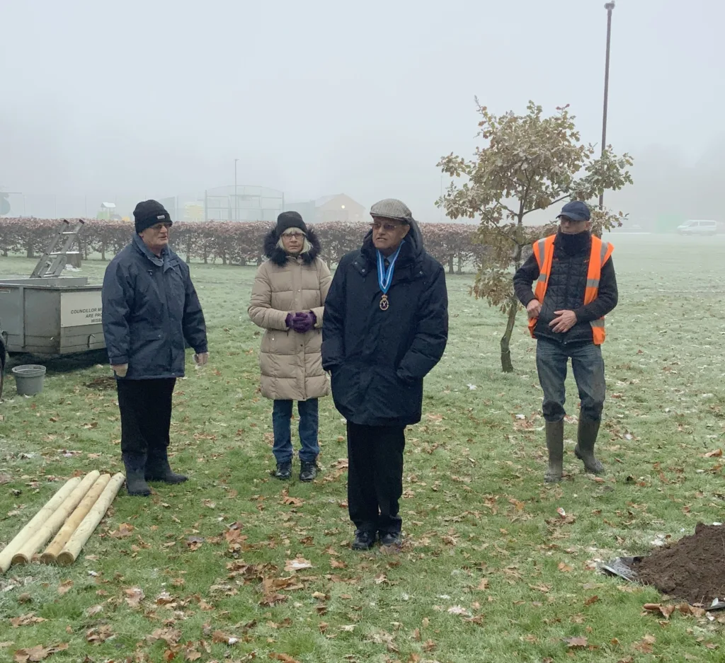 The High Sheriff of Cambridgeshire Dr Bharatkumar N Khetani plants a tree and unveils a plaque in memory of Covid victims was planted in Wisbech. PHOTO: Wisbech Tweet 