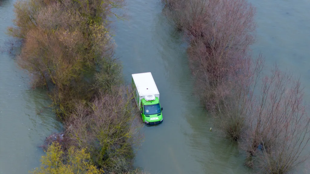 Morning after the night before: The Asda delivery van submerged in water midway through the Welney Wash Road on the A1101 bordering Cambridgeshire and Norfolk. PHOTO: Bav Media 