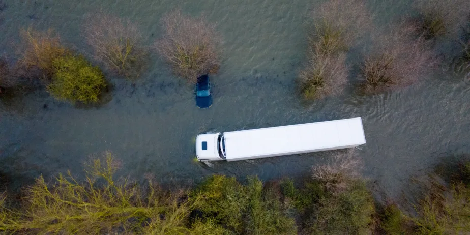 Abandoned car on the flooded A1101 in Welney, Norfolk, on Wednesday morning as the flooding continues after the recent heavy rain. PHOTO: BavMedia 