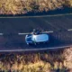 Driver pushing his car on the flooded A1101 in Welney in this morning (Mon). PHOTO: Bav Media