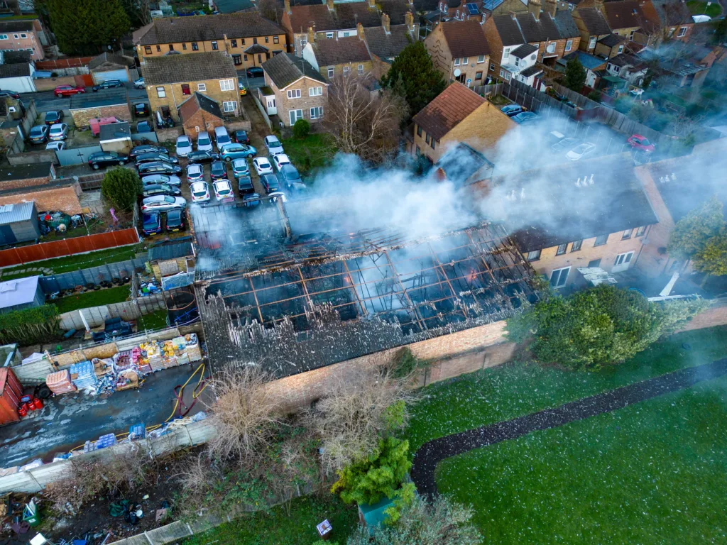 Aftermath of the blaze that destroyed Dungarwalla cash and carry in Padholme Road, Peterborough. Fire crews still in attendance today to dampen down. Friday 29 December 2023. PHOTO: Terry Harris. 