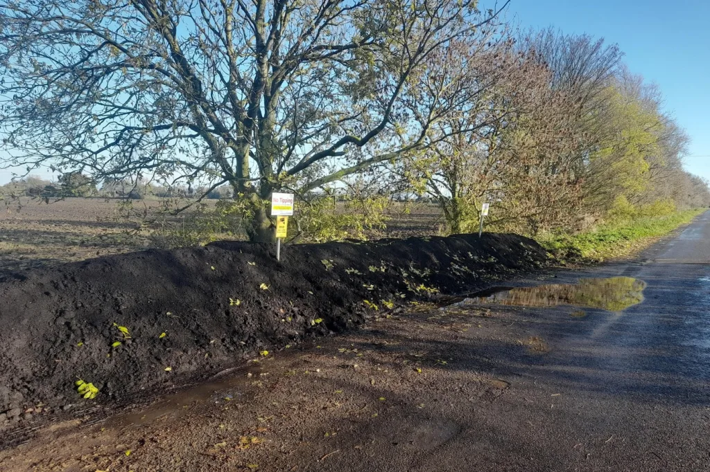 After: The site has been cleared and a soil and concrete bund put in place to deter fly-tippers.