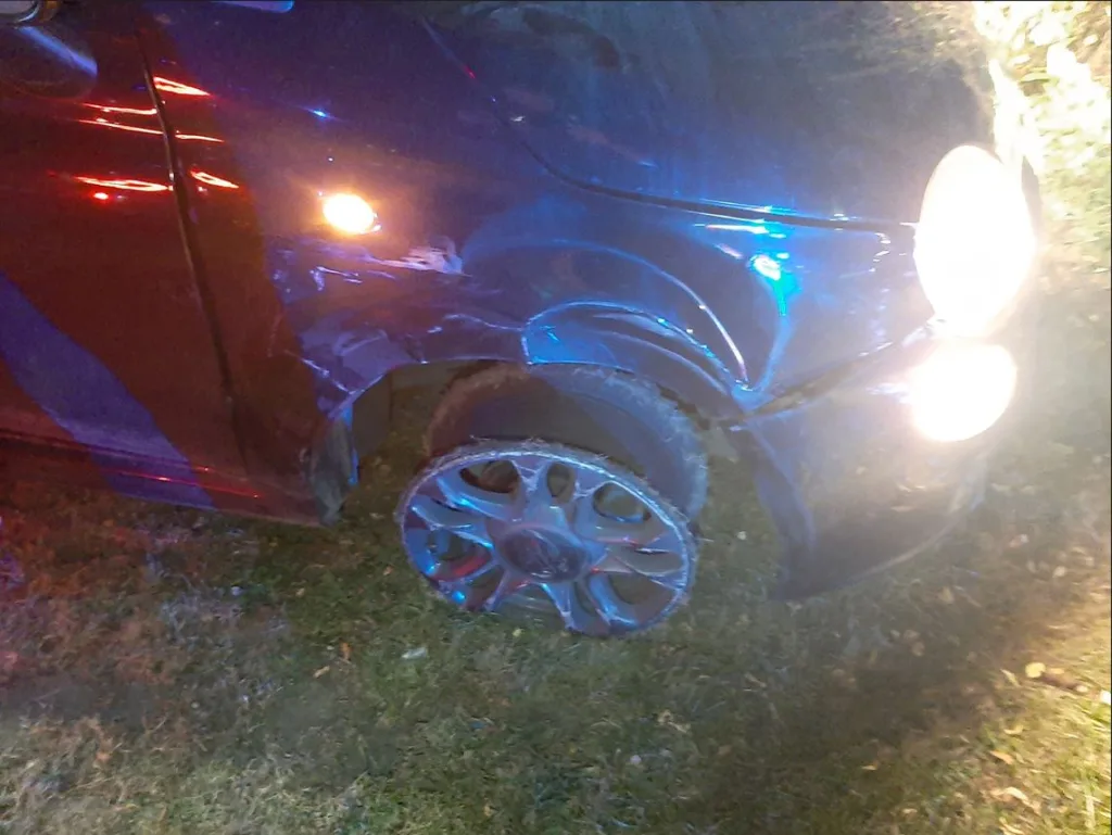 Logan Cook, 22, (centre) jailed after ramming police vehicles (right) and putting lives at risk by failing to stop in Peterborough. His car is on the left.