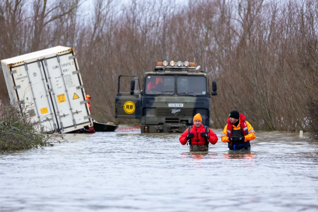 An articulated lorry was finally recovered from a flooded A1101 at Welney in Norfolk today (Thurs) after being stuck in the deep water for four days. PHOTO: Bav Media 