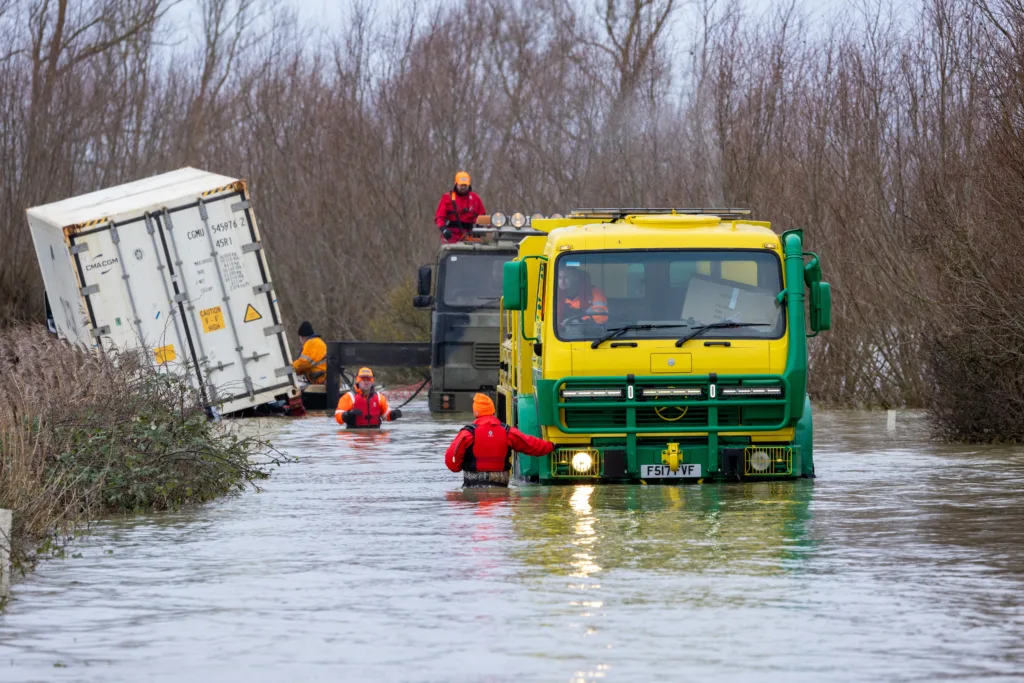 An articulated lorry was finally recovered from a flooded A1101 at Welney in Norfolk today (Thurs) after being stuck in the deep water for four days. PHOTO: Bav Media 