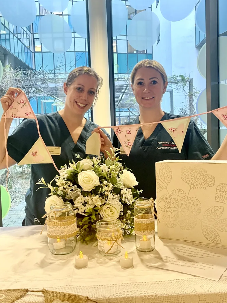 Critical outreach nurse practitioners Lois Kendall and Natasha Steels-Webb with some of the Wedding Box items.