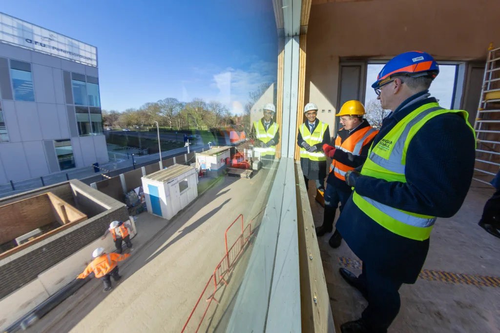 Anglian Ruskin University topping out ceremony for an extension to the Peterborough campus that will incorporate a ‘Living Lab’ public science and technology space. It will open in September. PHOTO: Terry Harris. 