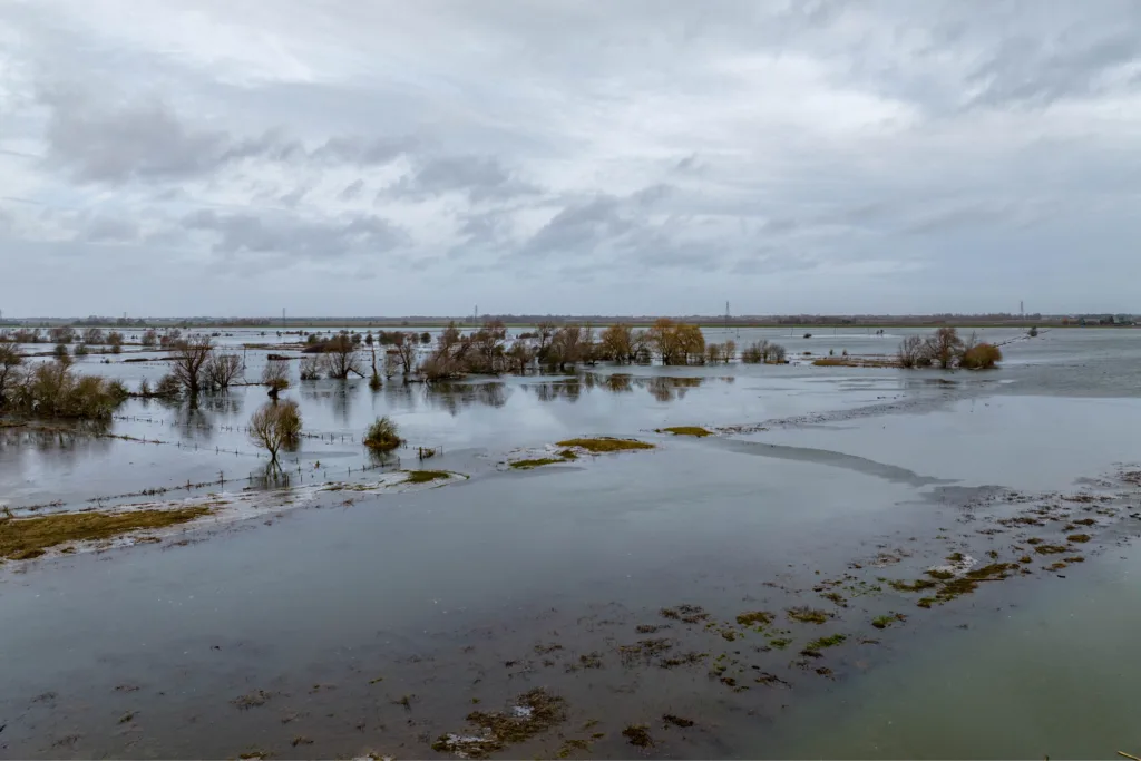 Flood water along the B1040 at Whittlesey as Storm Isha begins to batter Britain. The Environment Agency warned today that river levels at Whittlesey remain high “following a previous period of persistent rainfall in the catchment. PHOTO: Terry Harris
