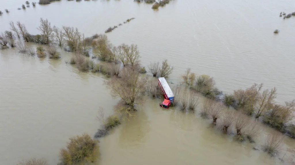 Well and truly stuck: The truck and trailer owned by Nolan Transport that attempted an unsuccessful crossing of Welney Wash road today. PHOTO: Bav Media 