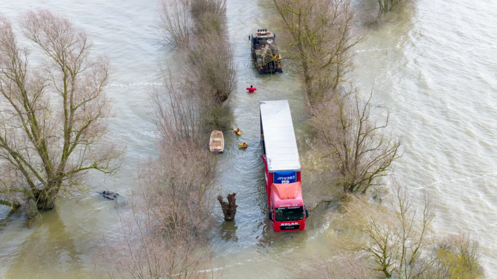 Recovery team from Manchetts were praised for their efforts in retrieving this cab and trailer that the driver was forced to abandon in the early hours of Monday on the flooded A1101 Welney Wash Road. PHOTO: Bav Media 