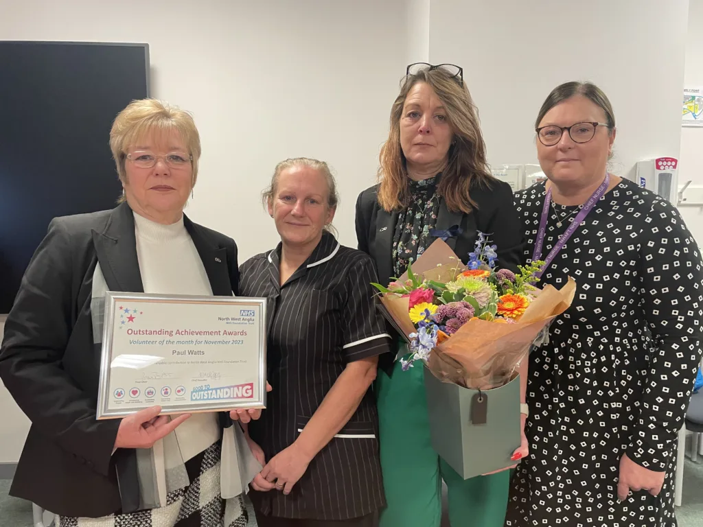 Volunteer Jet Watts receives a posthumous Outstanding Achievement Award in honour of her late husband Paul, with Rapid Responder Helen Gillies, daughter Clare Watts and Chief Nurse Jo Bennis.