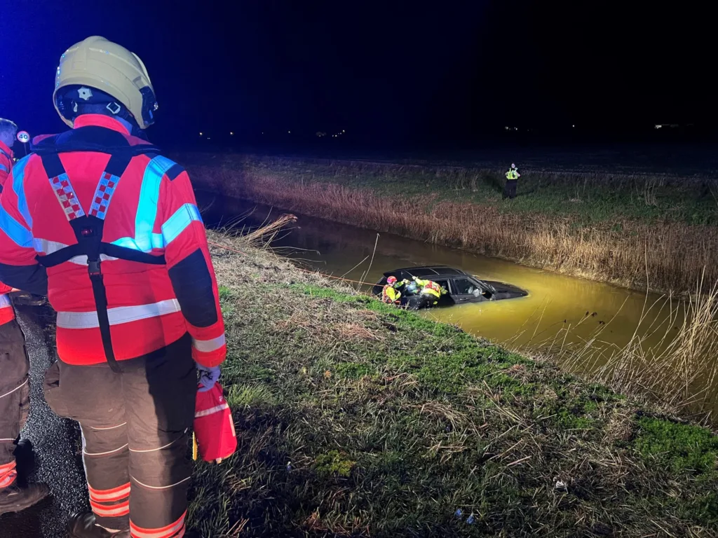 Emergency workers establish the car in the river at Prickwillow had no occupants