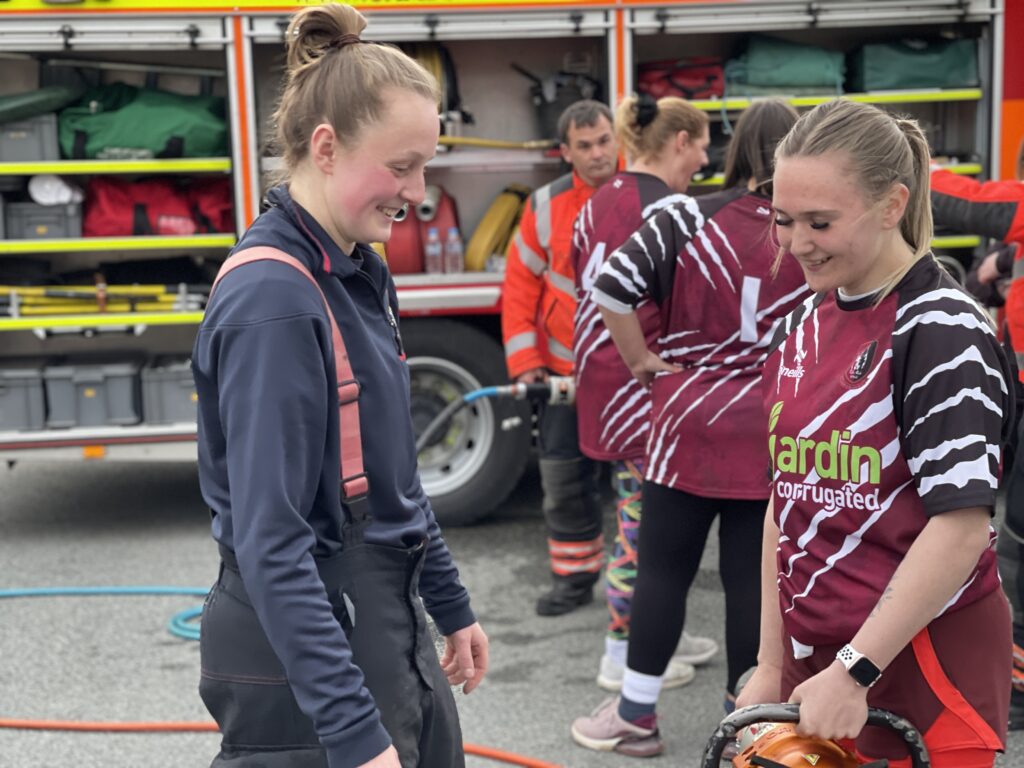 The women’s team of March Bears Rugby Club learn some basic fire fighter techniques during a visit to March Fire Station. PHOTO: Cambs Fire and Rescue