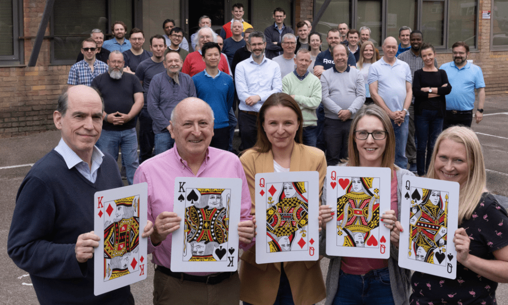 Thermoteknix celebrates a fifth Royal award. Pictured front - from left - Bruce Cairnduff (Engineering Manager), Richard Salisbury (Managing Director and Company Founder), Anna Kwiecień (Purchasing Administrator), Hollie Walsh (Sales Co-Ordinator) and Louise Barton (Office Manager) celebrating their success in securing another Royal award with Thermoteknix staff outside their headquarters in Cambridge, United Kingdom.