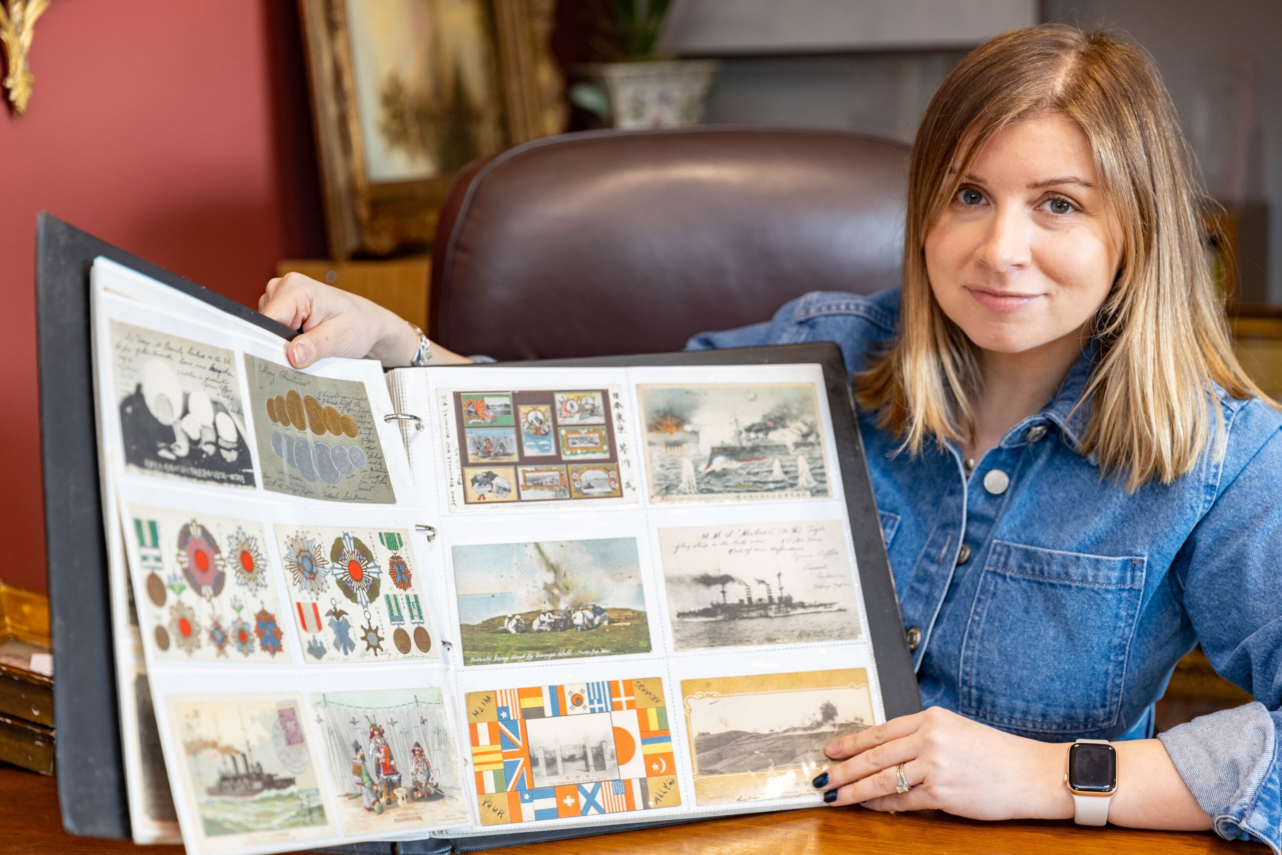 An album of more than 230 postcards sent from a stamp collector in Tokyo. BATEMANS AUCTIONEERS, Stamford Picture by Terry Harris / Bav Media.