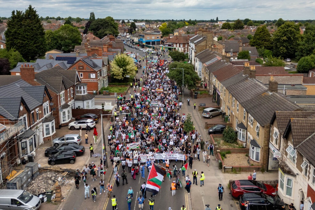 March for Free Palestine Peterborough. The march left Lincoln Road Park and ended at Cathedral Square where speakers addressed the public. Lincoln Road / Cathedral Square, Peterborough Sunday 23 June 2024. Picture by Terry Harris.