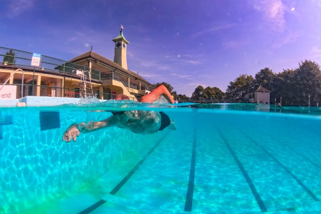 Swimmers in Peterborough take advantage of the heat and dive into The Lido pool. Friday 19 July 2024. PHOTO: Terry Harris 