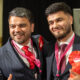 Councillor Amjad Iqbal (left) celebrating his election success in May PHOTO: Terry Harris