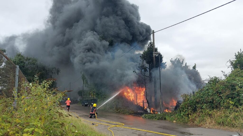 An electricity pylon in Oldfield Lane Wisbech caught fire after being used to illegally abstract power to run a cannabis factory in a neighbouring scrapyard. A second cannabis factory elsewhere was discovered. PHOTO: Policing Fenland/Cambs Fire and Rescue 
