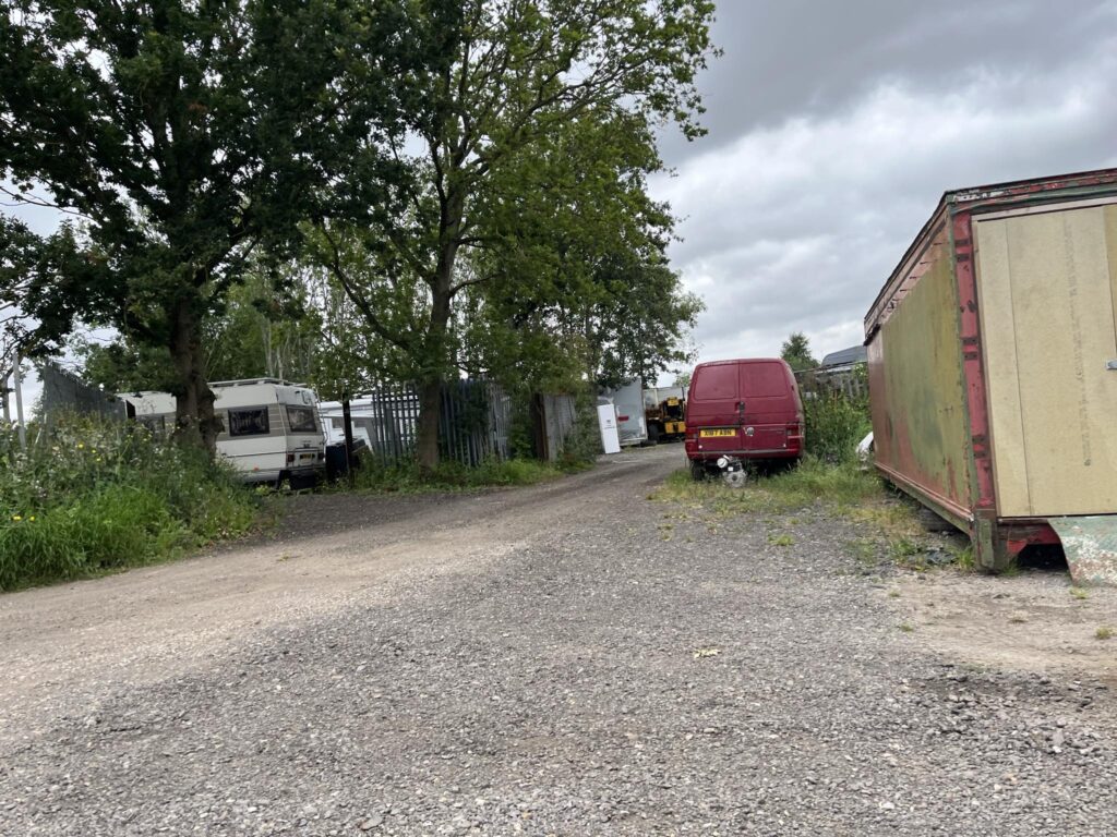 Housing planned for Brownlows Yard in Creek Road, March: within the brownfield land, there are commercial buildings and land being used for the storage of commercial and building materials, vehicles, and a caravan. PHOTO: John Elworthy